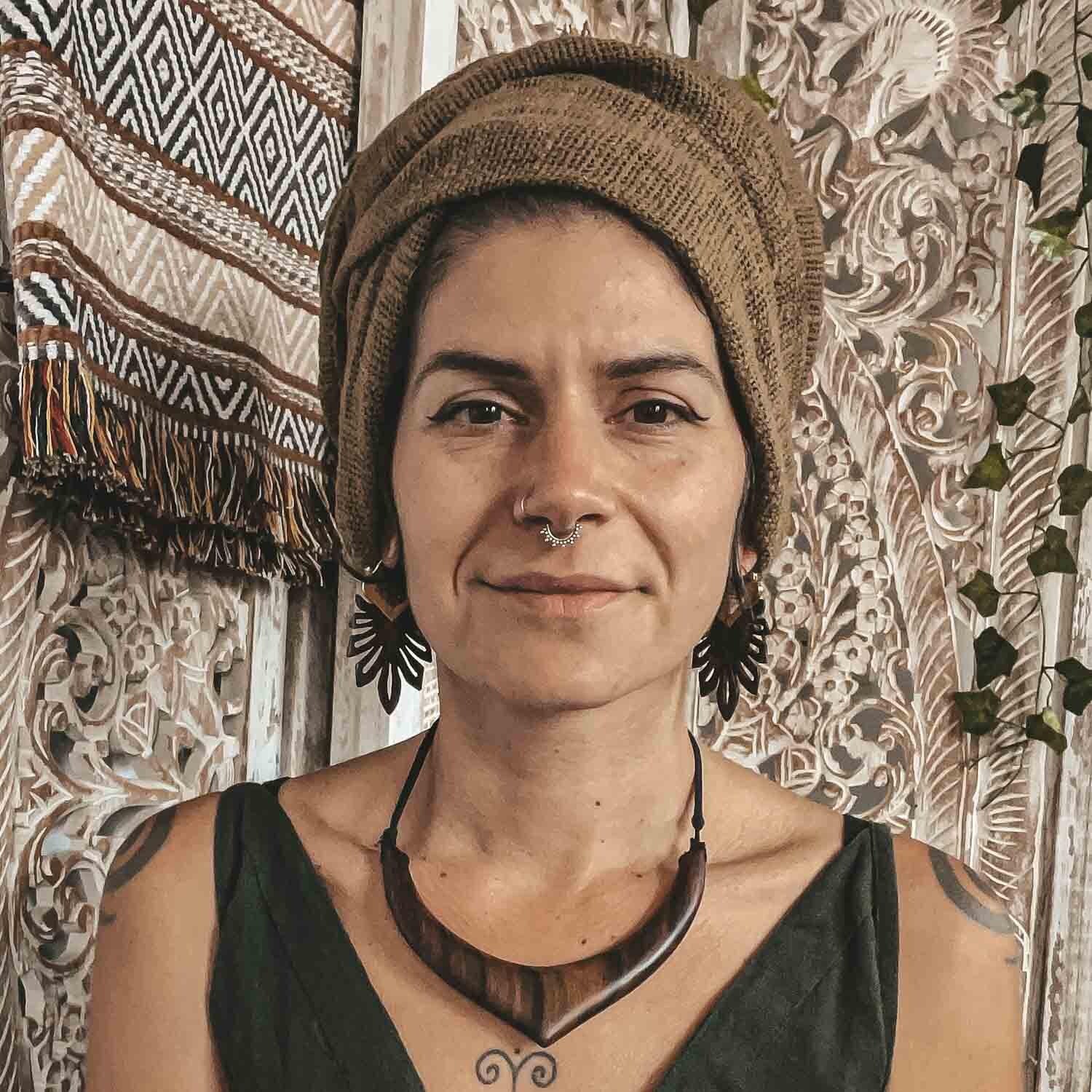 Front view of a person wearing CrafterElena Jungle Earrings