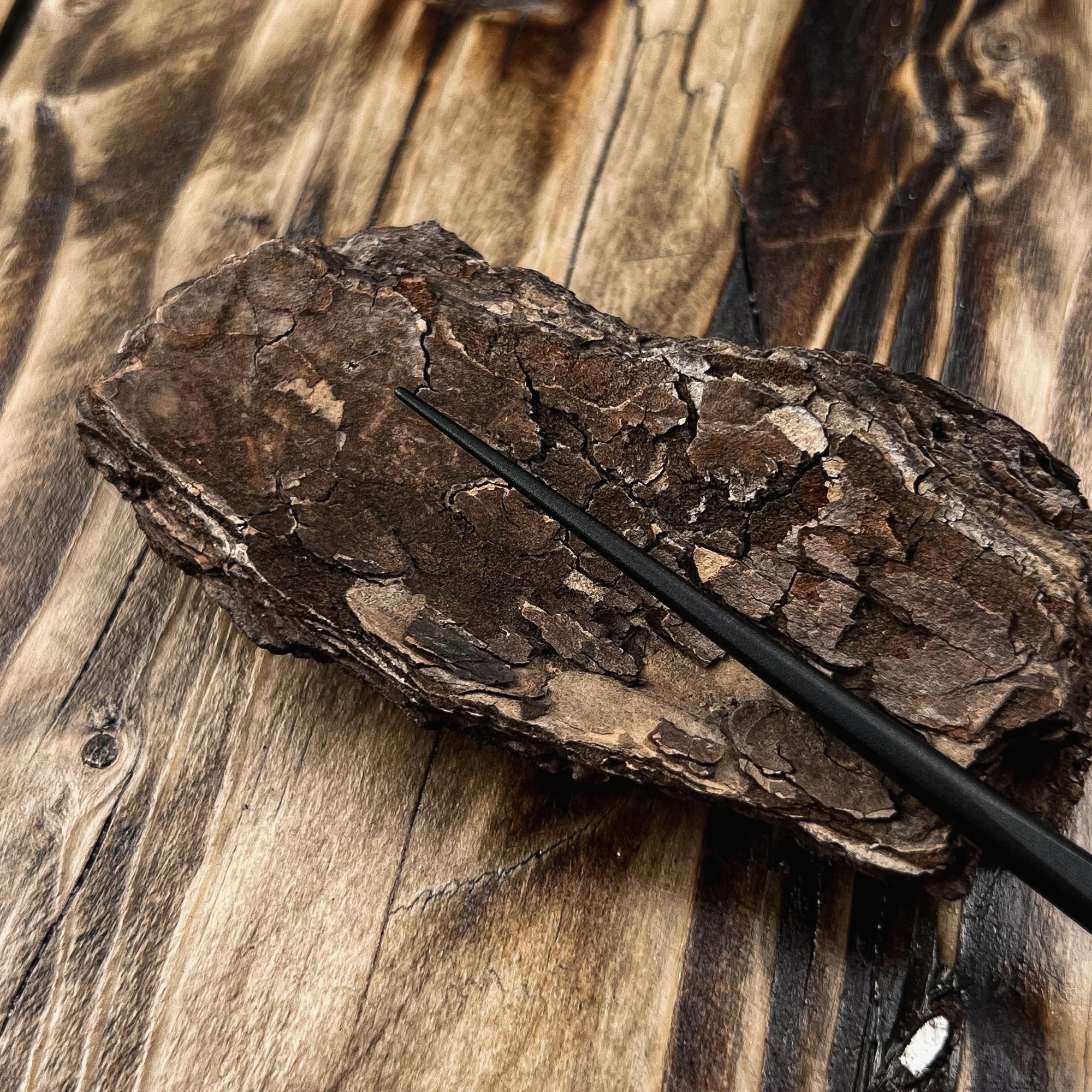 Precision metal pin tail designed for clean hair partings during Loc installation, maintenance and styling.