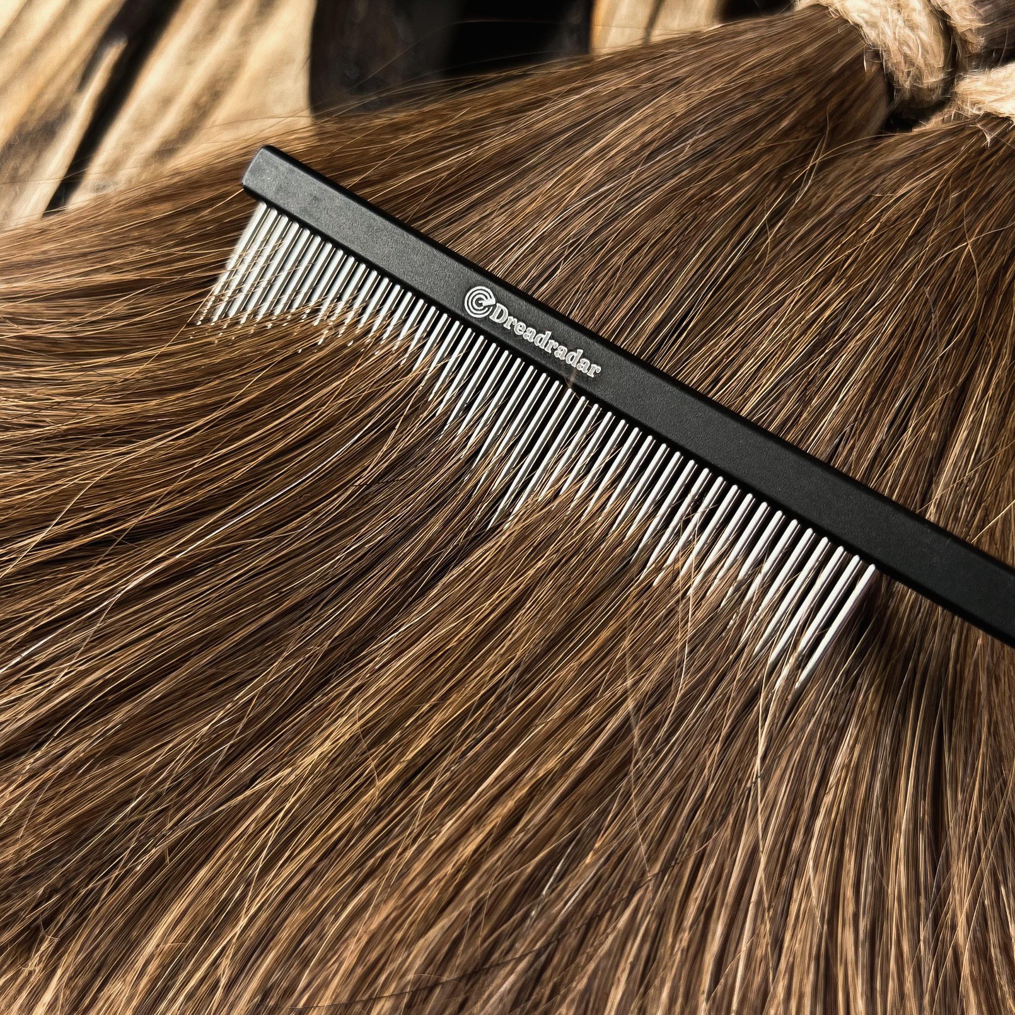 Professional Pin Tail Comb creating clean hair sections for Loc installation, braids and protective styles.