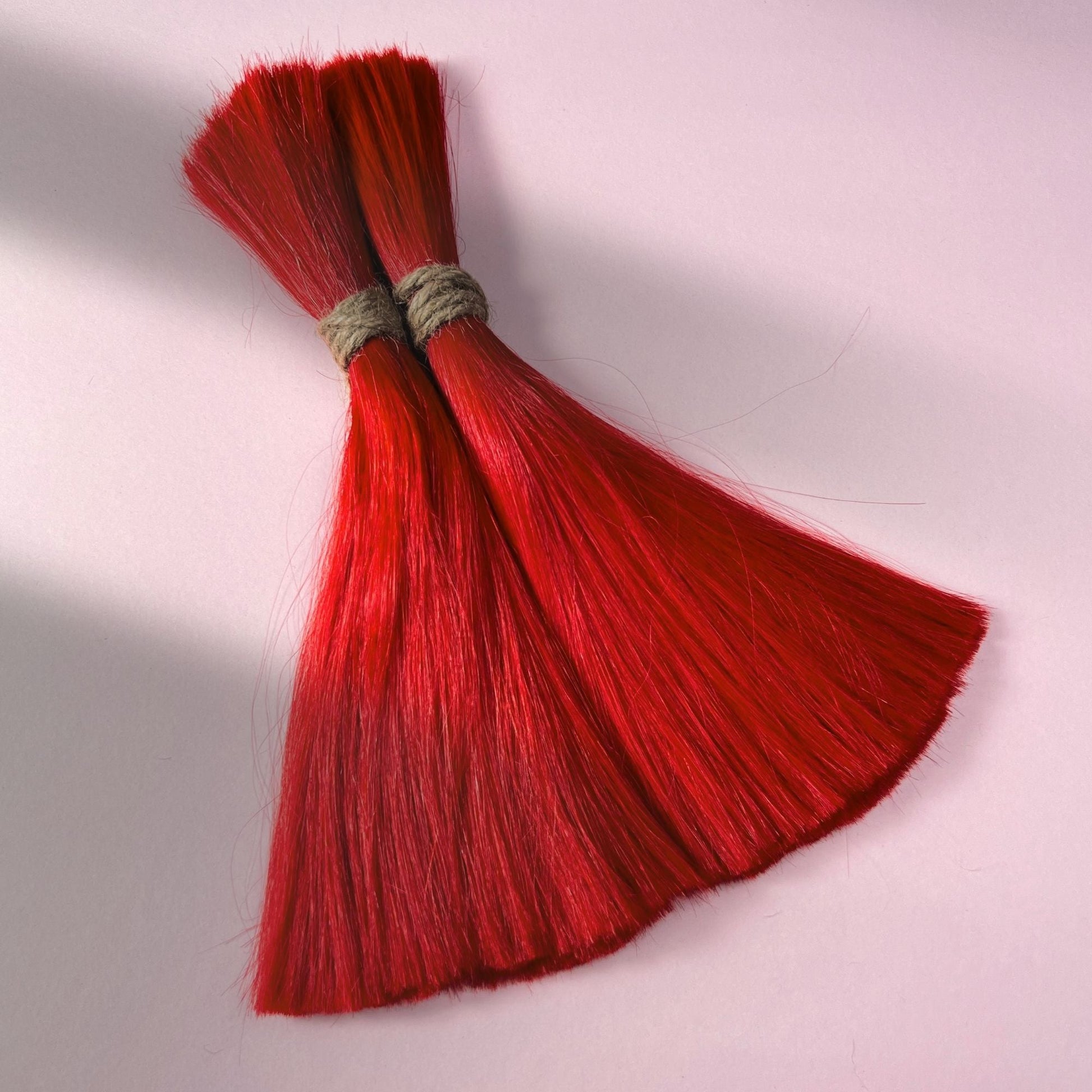 Full view of straight human hair in Flame Red.
