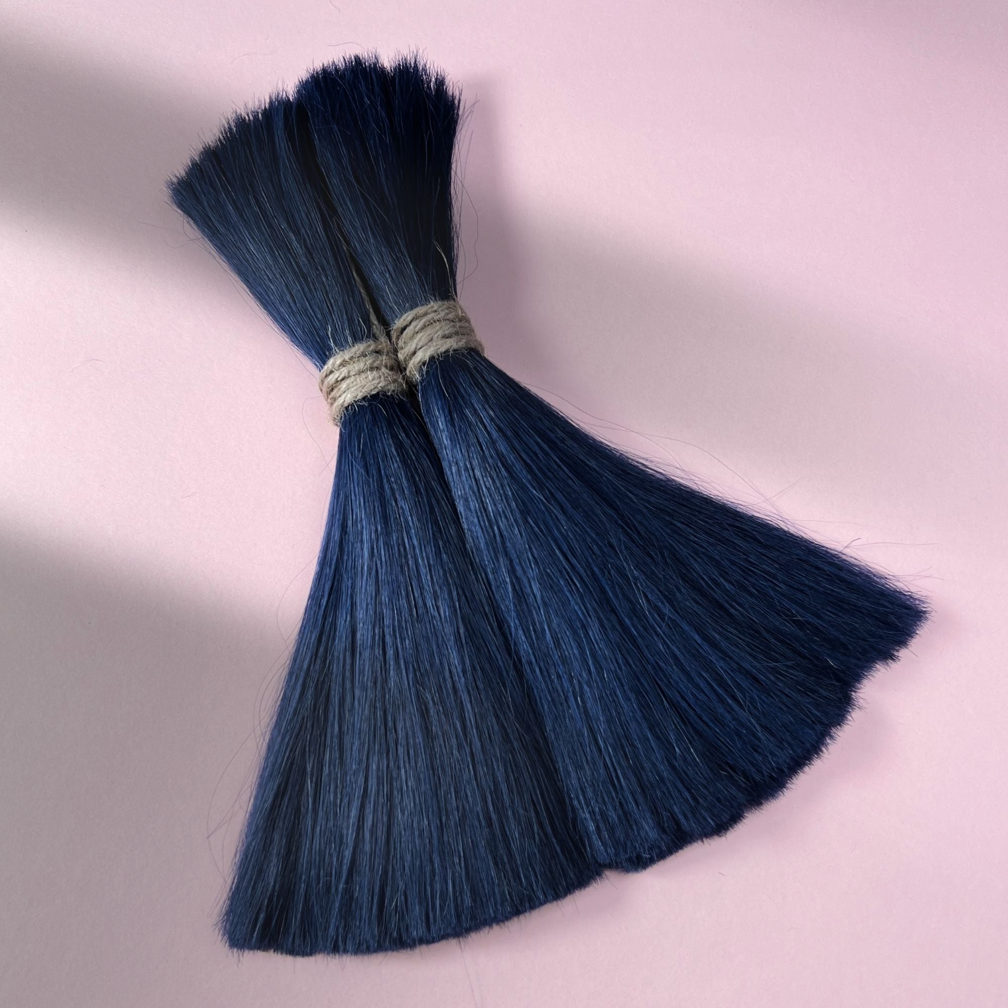 Full view of midnight blue loose human hair for Straight Loc Extensions