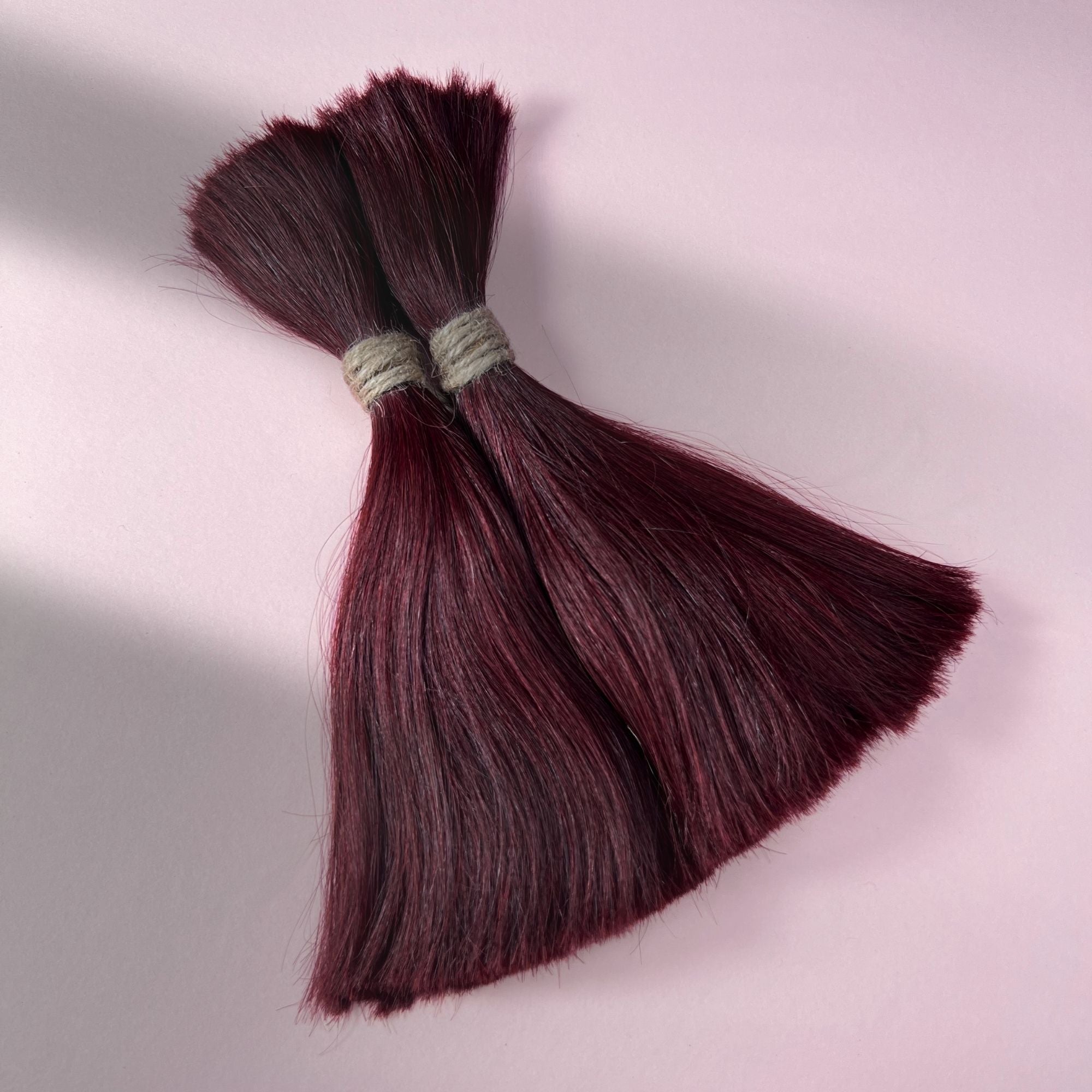 Full view of rich burgundy red loose human hair for Straight Loc Extensions