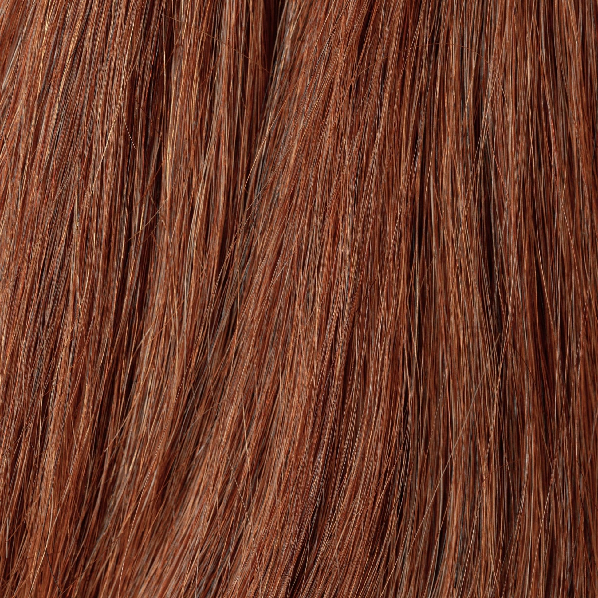Close-up of Burnt Sienna loose human hair texture for Straight Loc Extensions