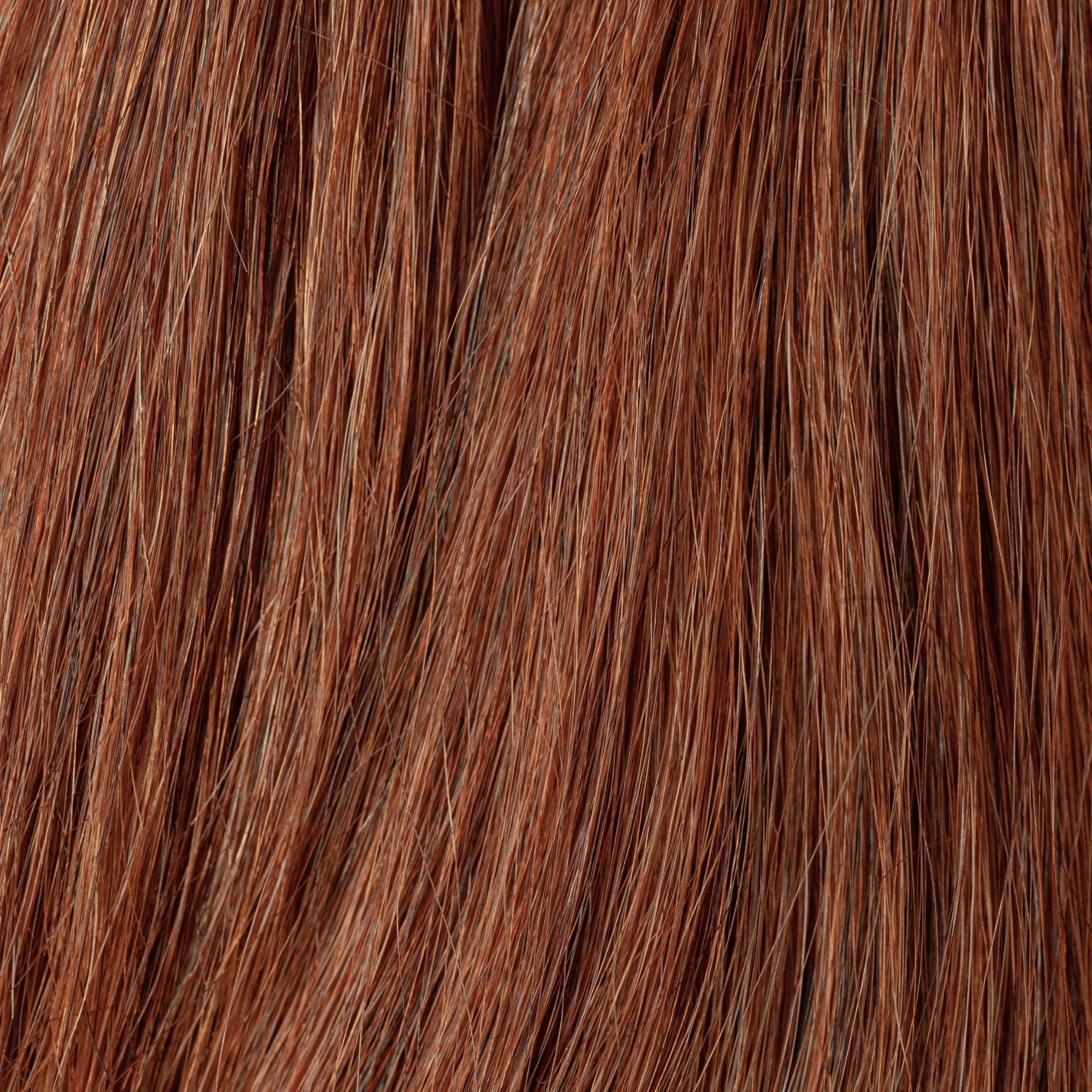 Close-up of Burnt Sienna loose human hair texture for Straight Loc Extensions