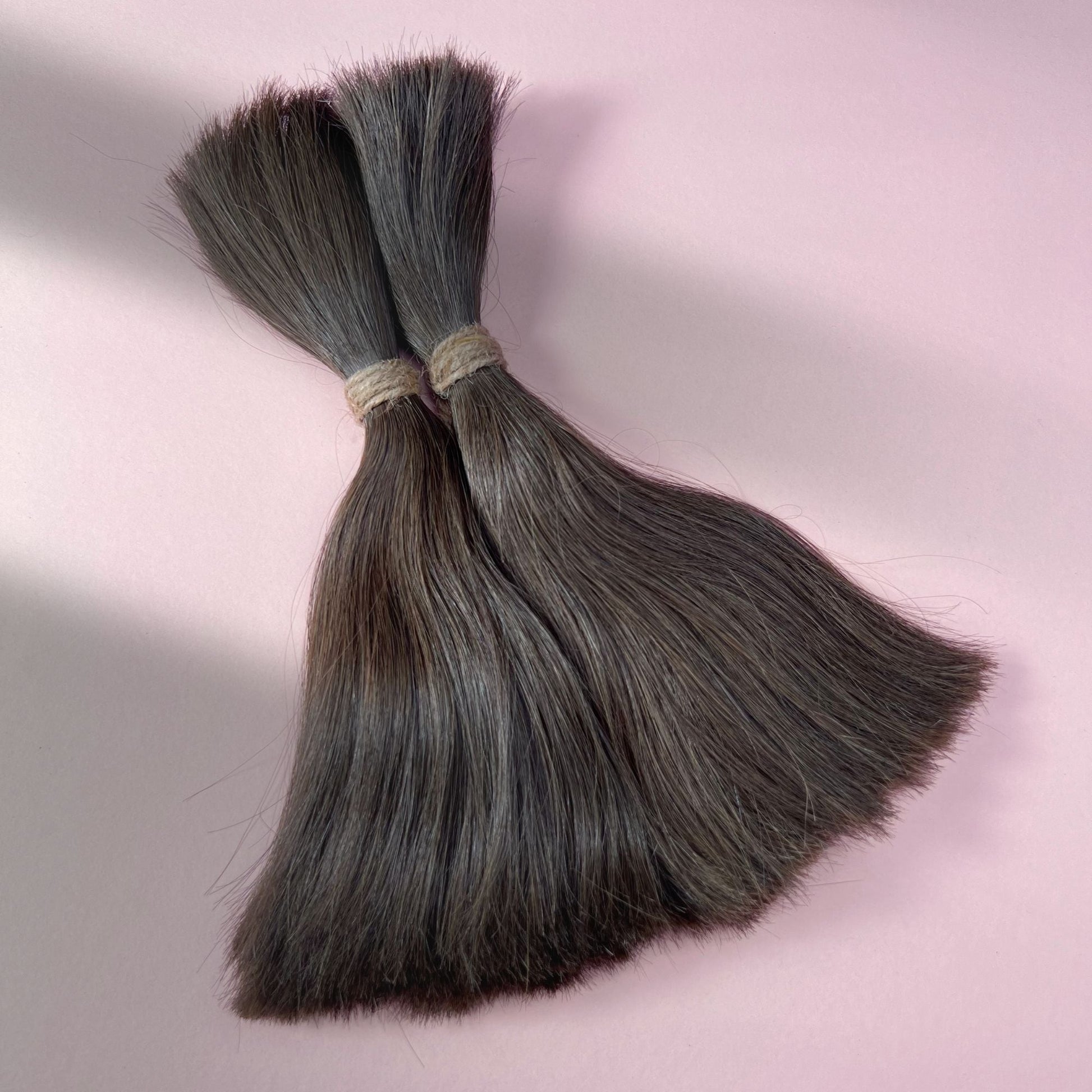 Full view of straight human hair in Dark Wenge Brown.