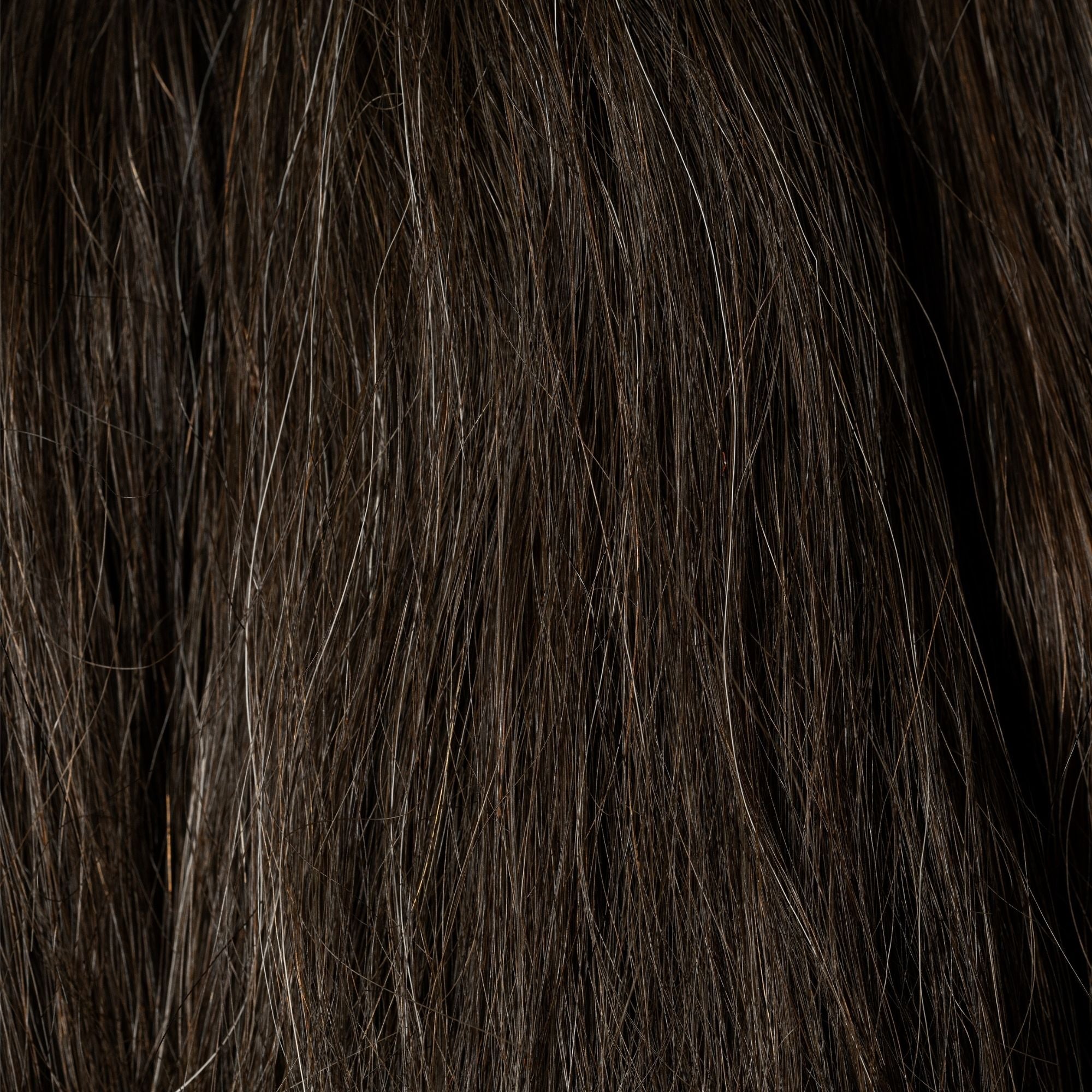 Close-up of Dark Wenge loose human hair texture for Straight Loc Extensions