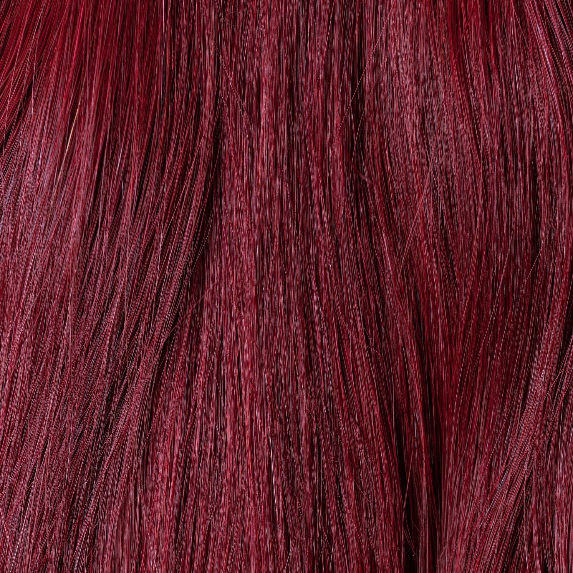 Close-up of Garnet Glow loose human hair texture for Straight Loc Extensions