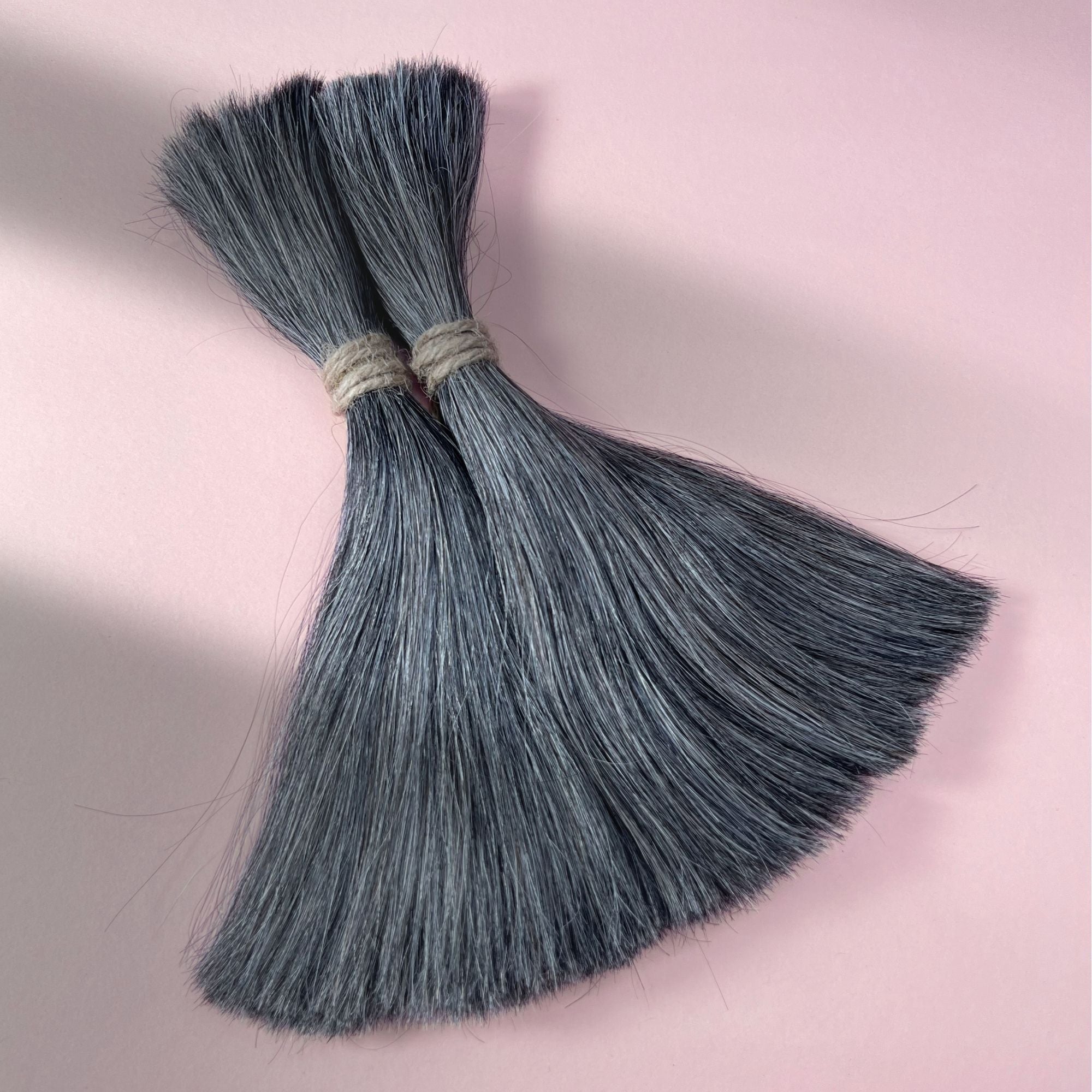 Full view of straight human hair in Steel Silver.