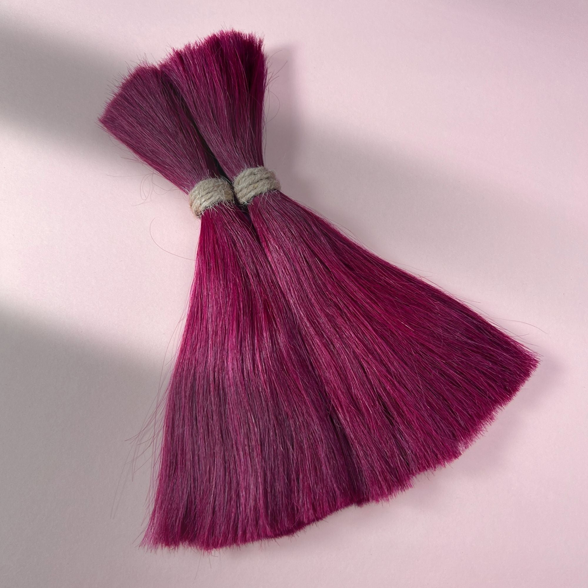 Full view of straight human hair in Dark Cherry Red.