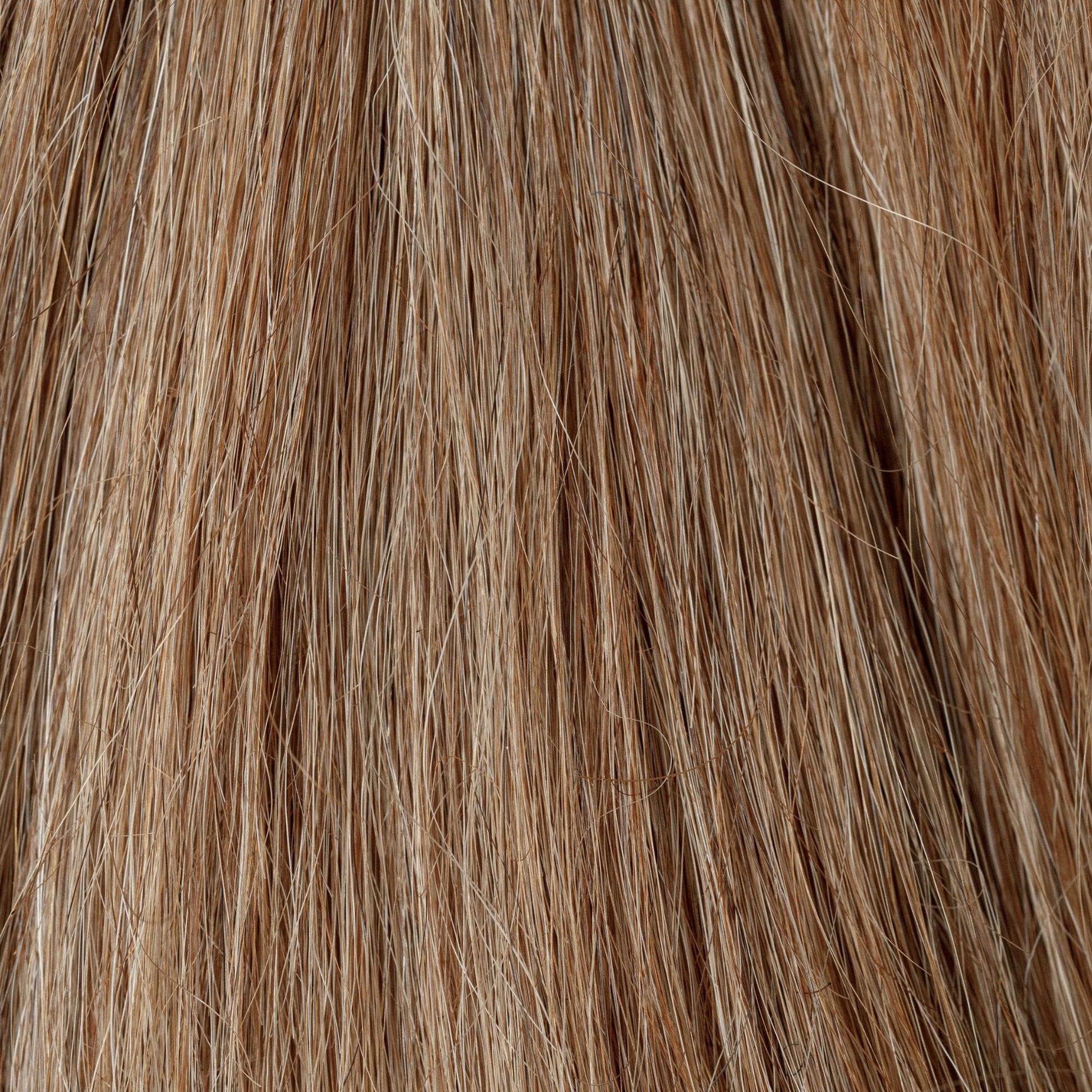 Close-up of Hourglass loose human hair texture for Straight Loc Extensions