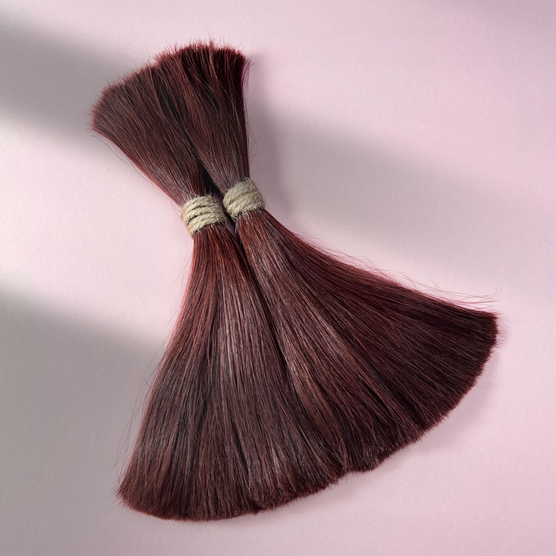 Full view of warm mahogany red loose human hair for Straight Loc Extensions
