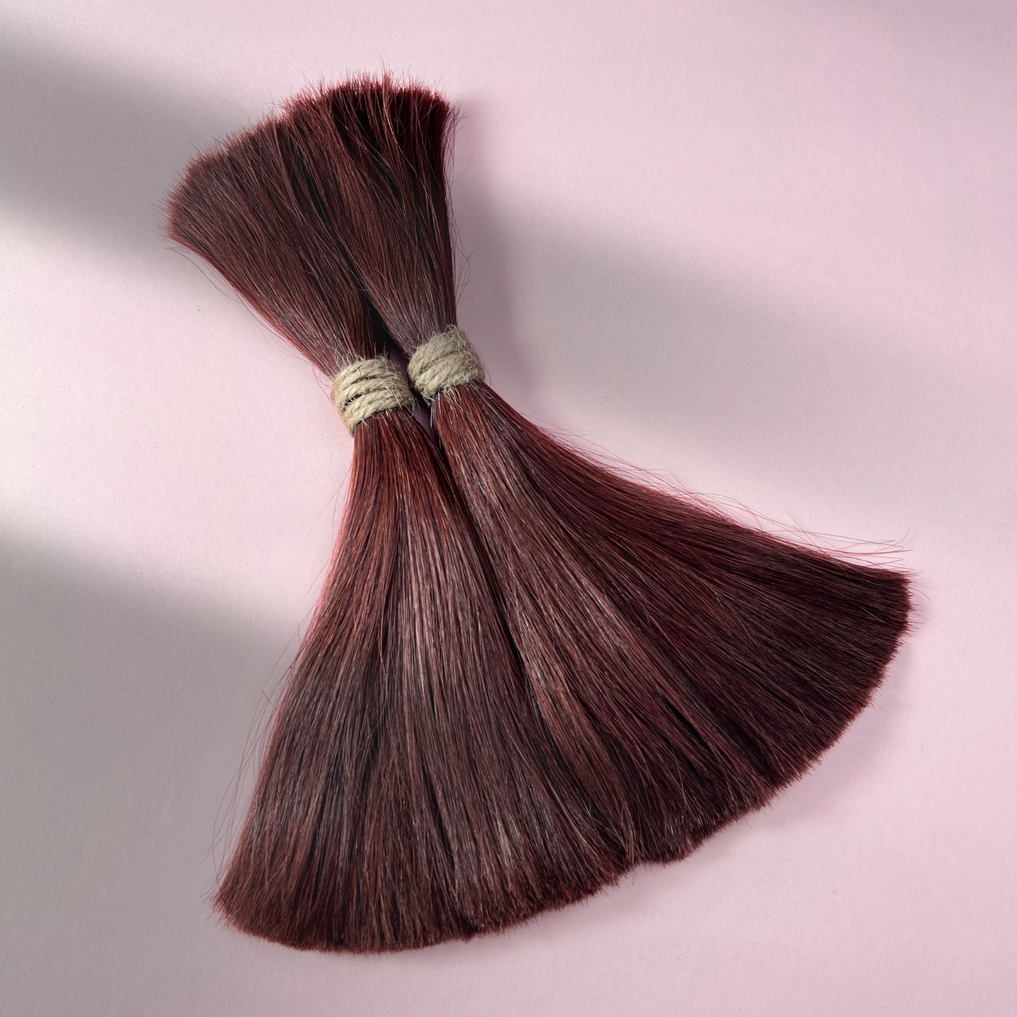 Full view of warm mahogany red loose human hair for Straight Loc Extensions
