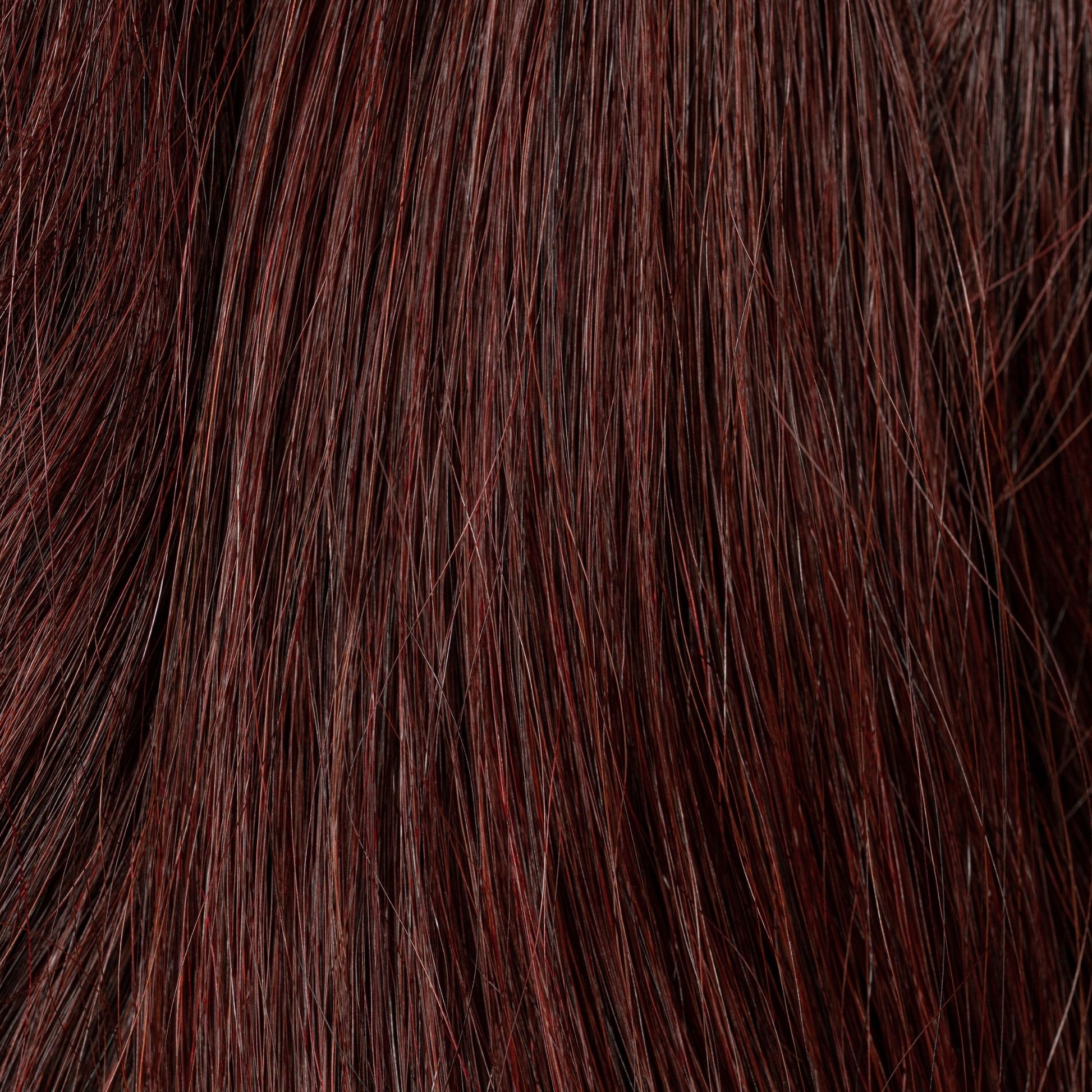 Close-up of Mahogany Nuwood loose human hair texture for Straight Loc Extensions