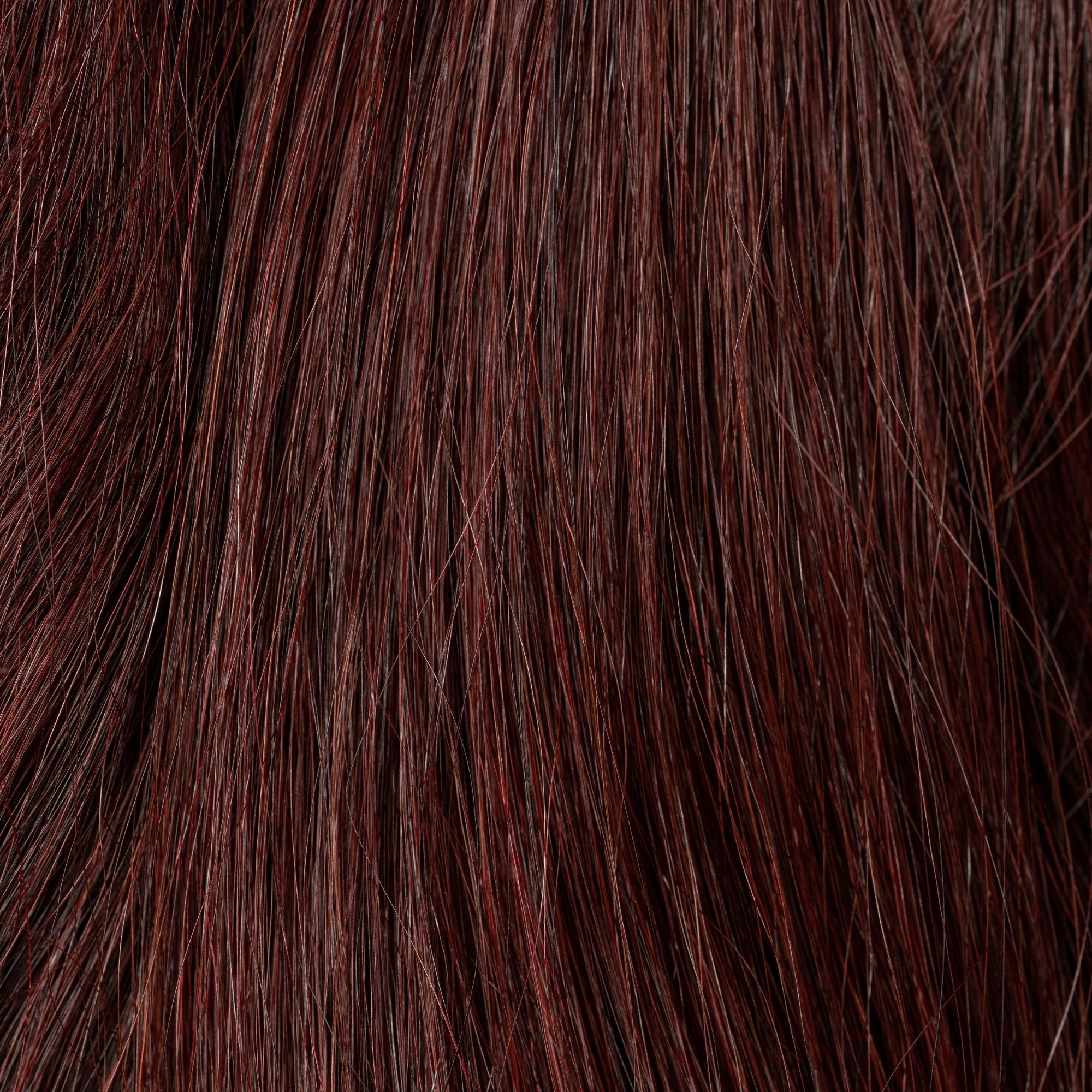 Close-up of Mahogany Nuwood loose human hair texture for Straight Loc Extensions