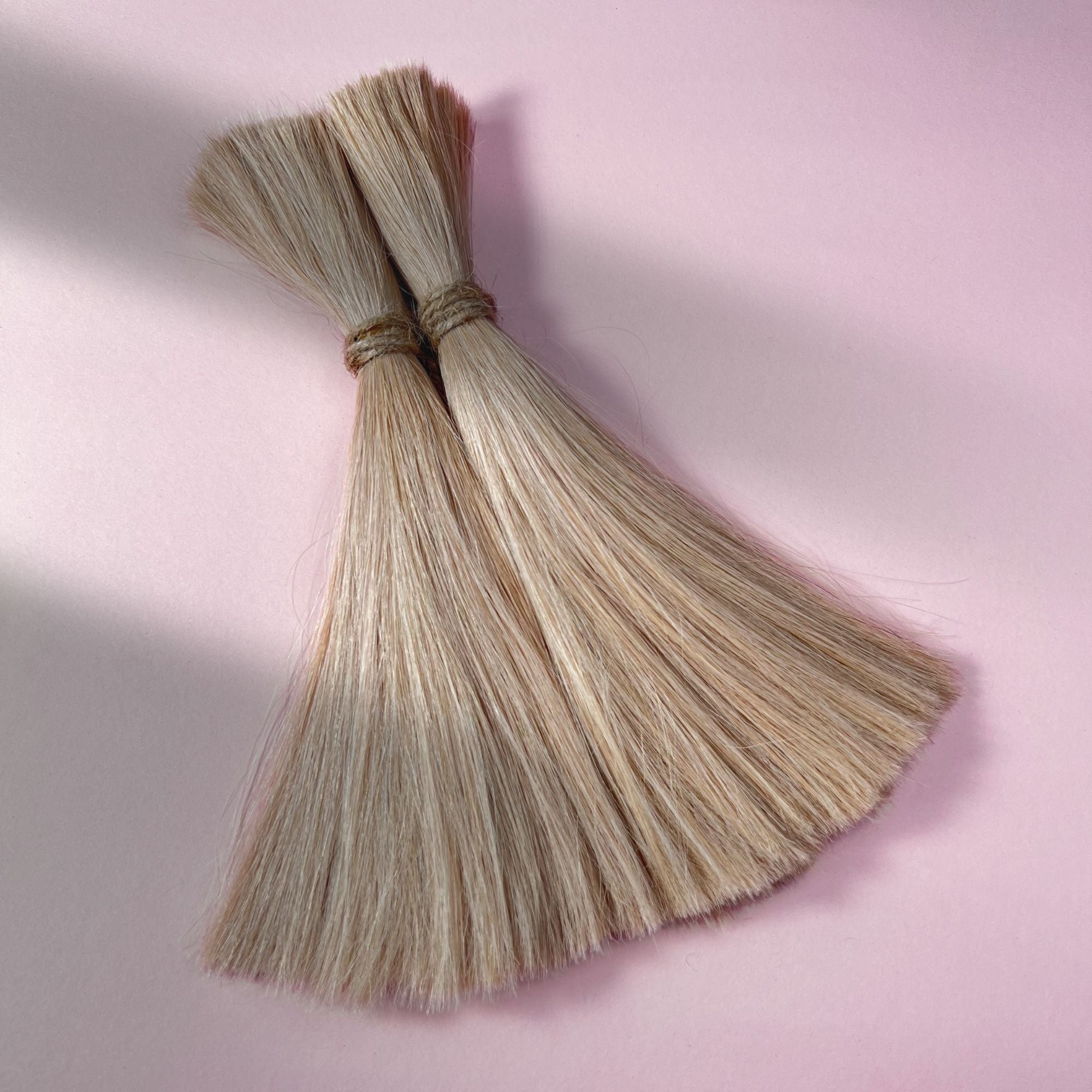 Full view of straight human hair in Vanilla Blonde.