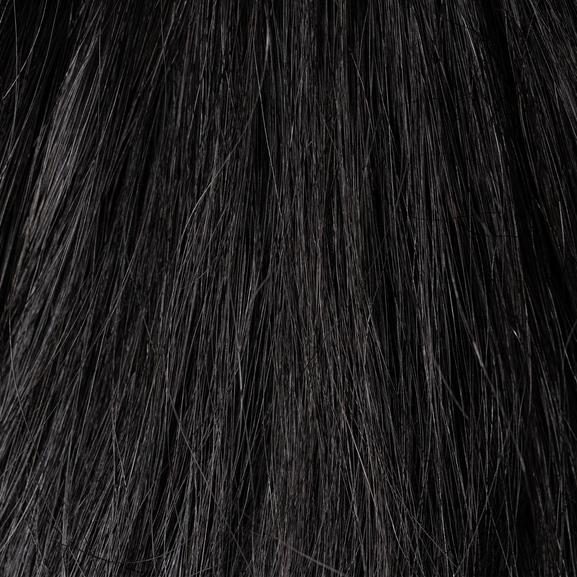Close-up of Mystery Of The Ancient Ruins loose human hair texture for Straight Loc Extensions