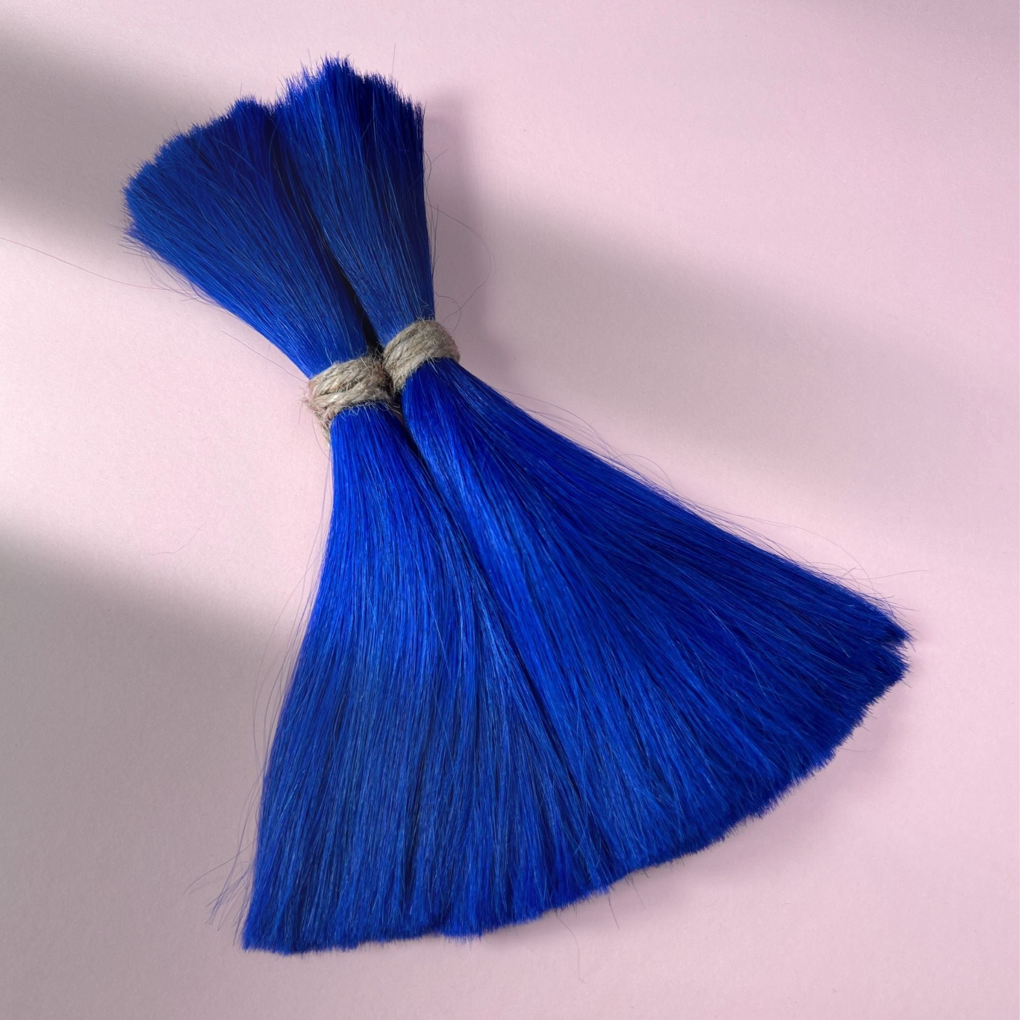 Full view of straight human hair in Deep Navy Blue.