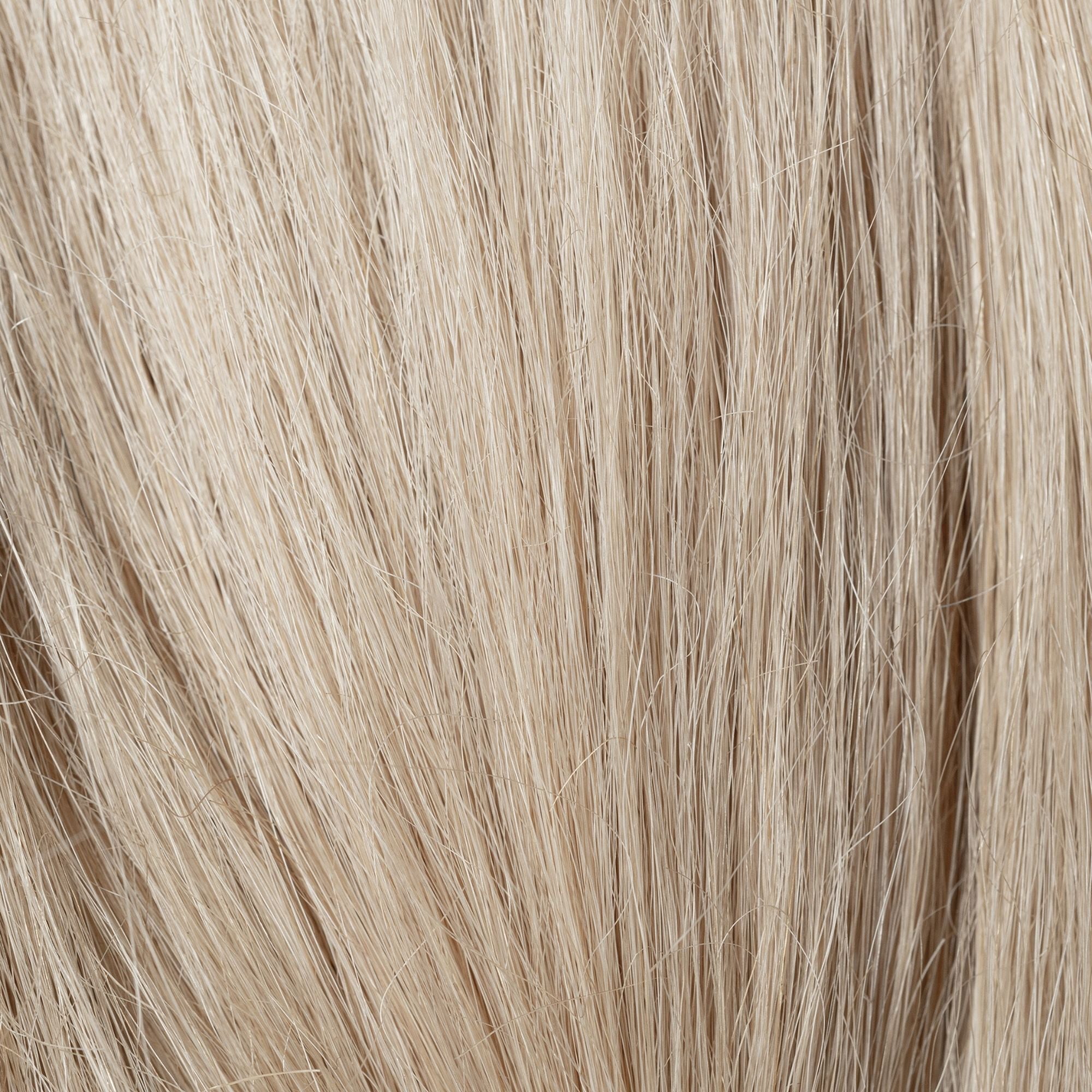 Close-up of Oat Milk loose human hair texture for Straight Loc Extensions