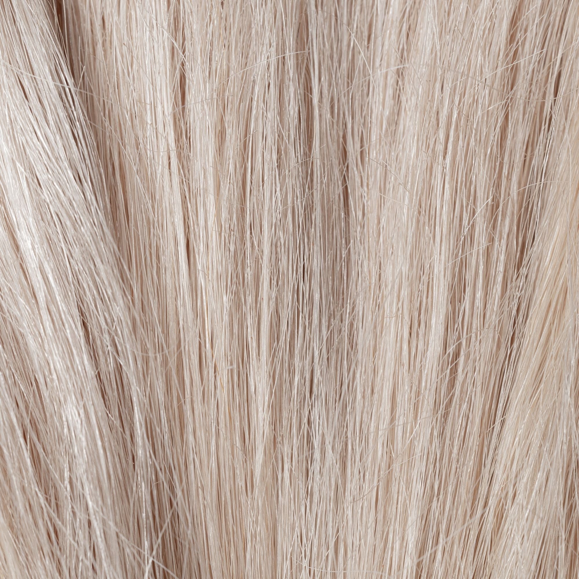Close-up of Pale Dogwood loose human hair texture for Straight Loc Extensions