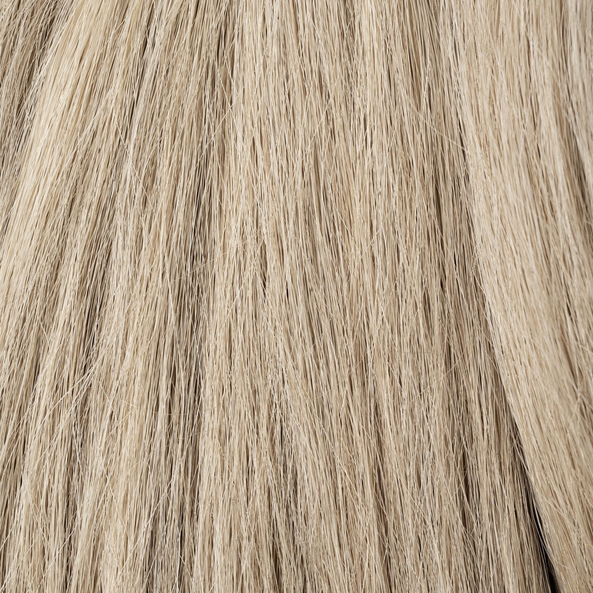 Close-up of Place In The Sun loose human hair texture for Straight Loc Extensions