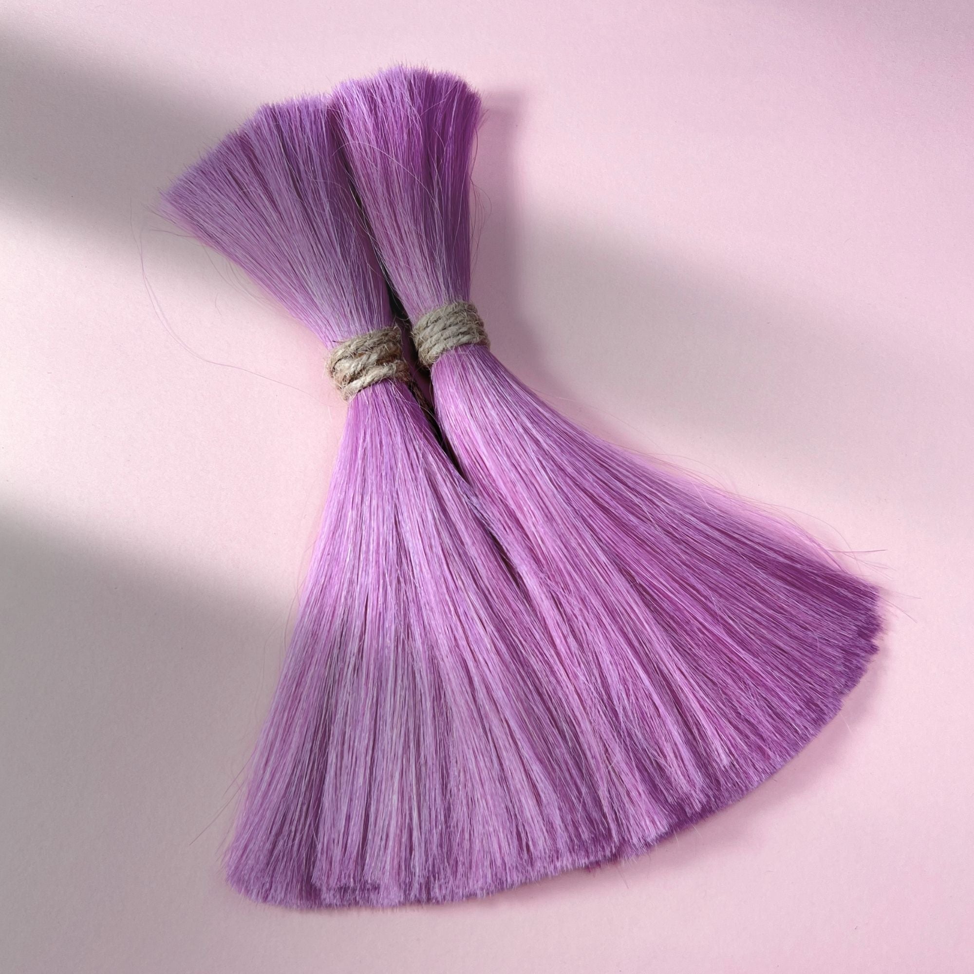 Full view of straight human hair in Lavender Purple.