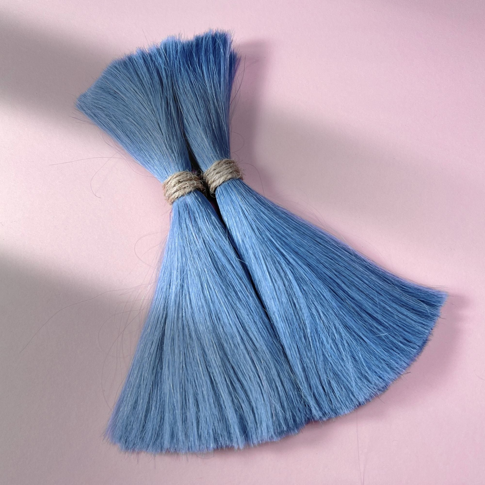 Full view of straight human hair in Sky Blue.