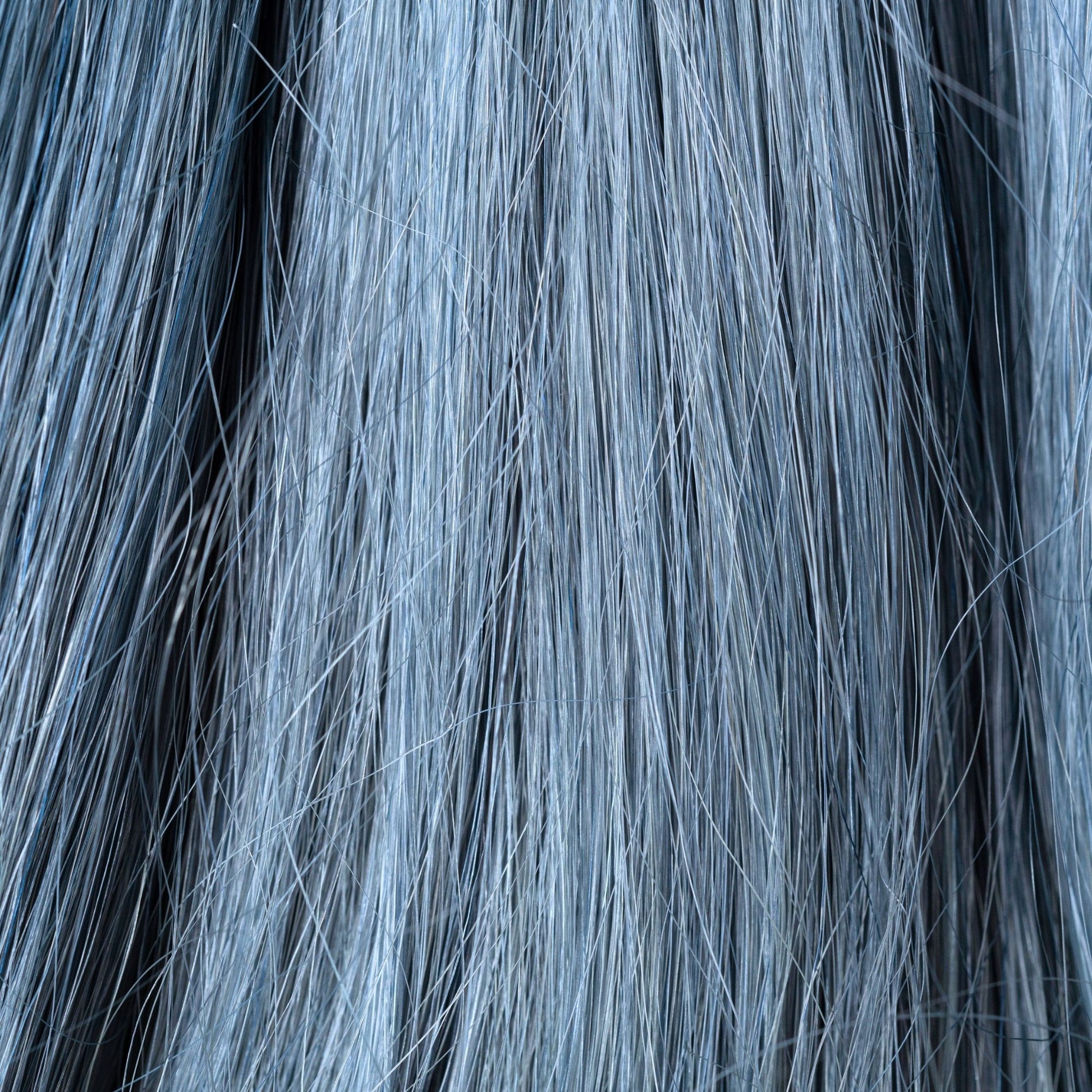 Close-up of Sky Reflection loose human hair texture for Straight Loc Extensions