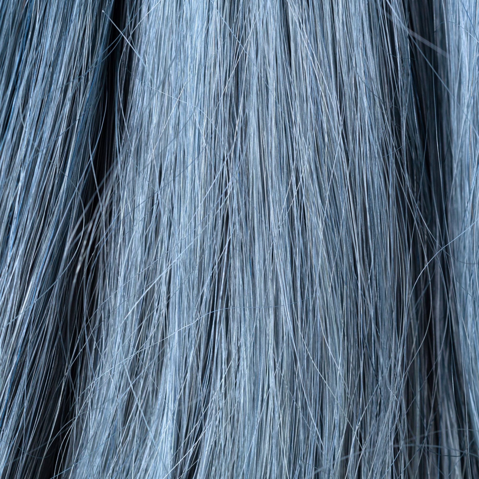 Close-up of Sky Reflection loose human hair texture for Straight Loc Extensions