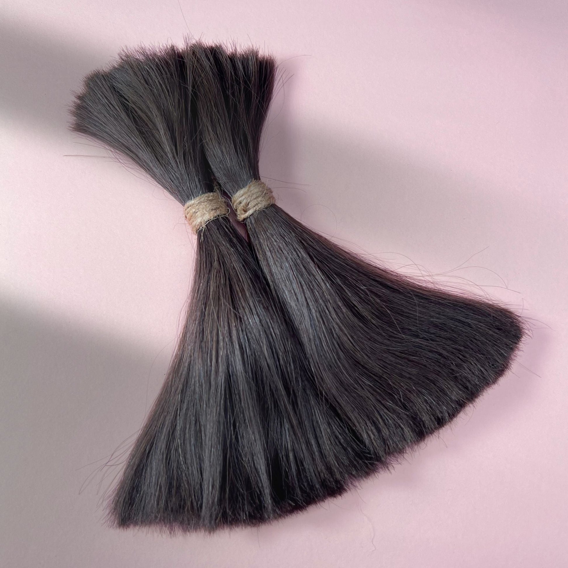 Full view of straight human hair in Warm Espresso Brown.