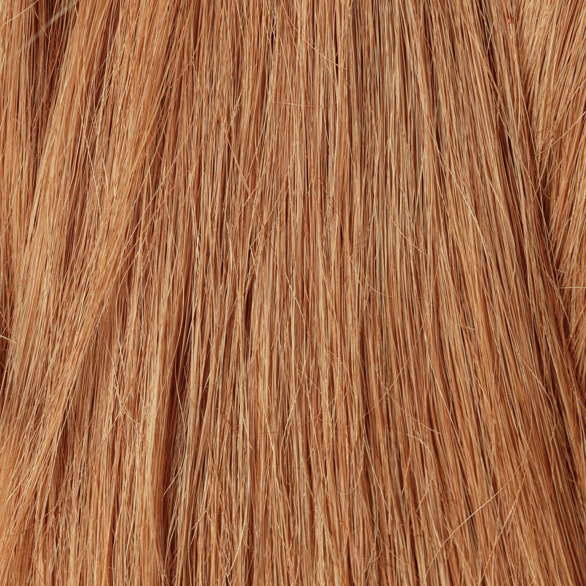 Close-up of The Golden Age loose human hair texture for Straight Loc Extensions