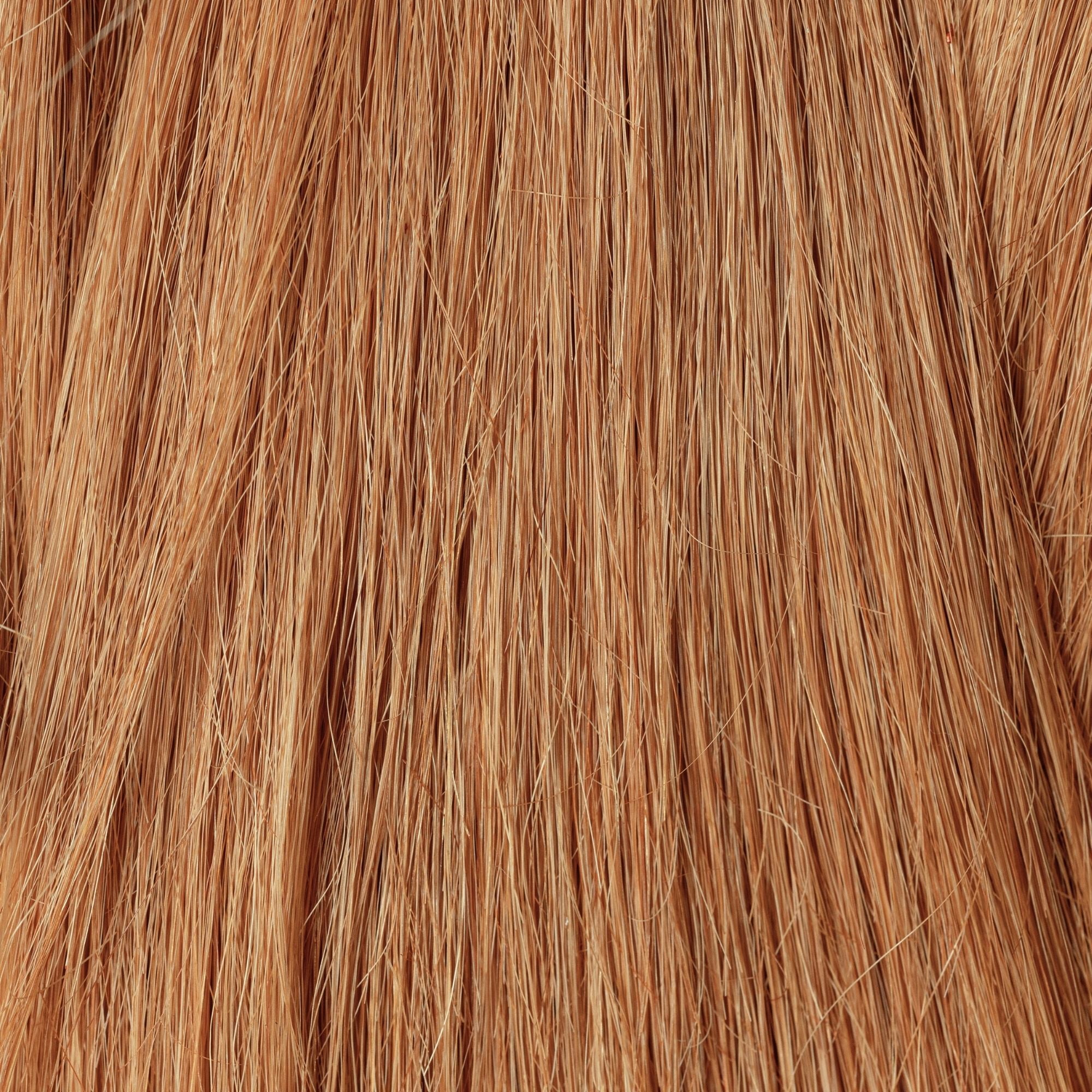 Close-up of The Golden Age loose human hair texture for Straight Loc Extensions