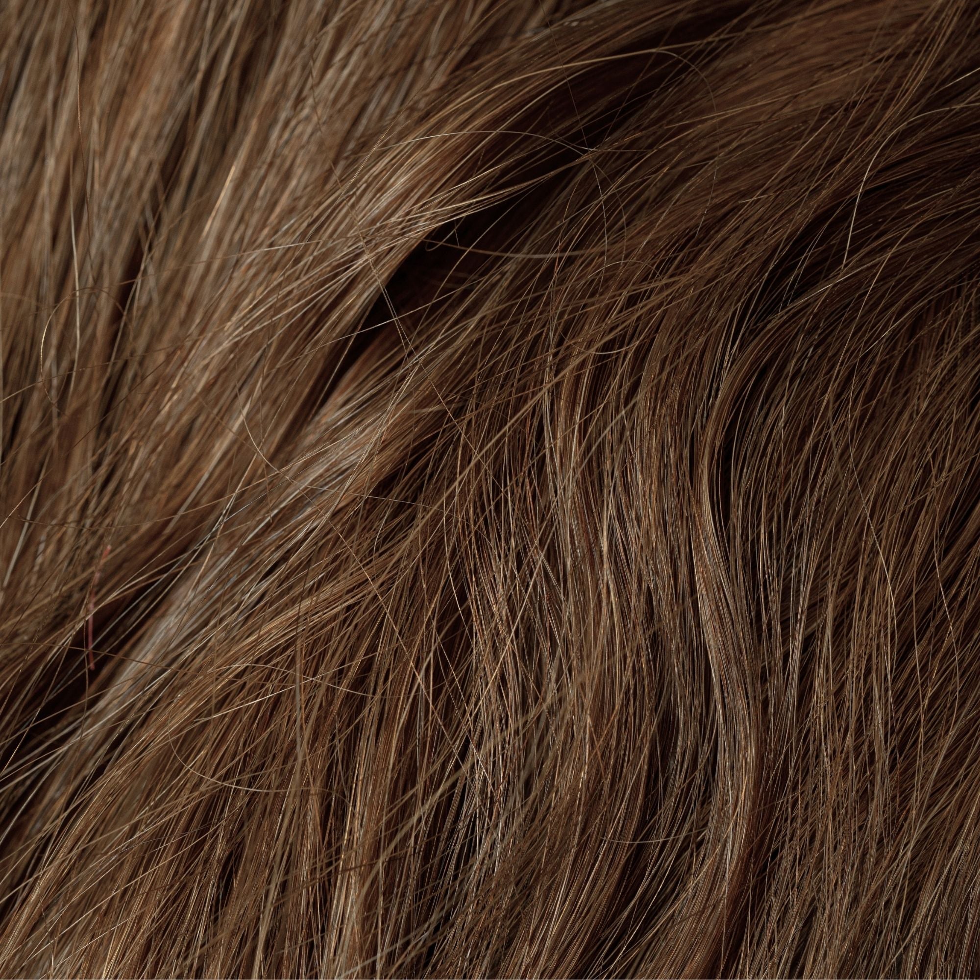 Close-up of Tiger Oak loose human hair texture for Straight Loc Extensions