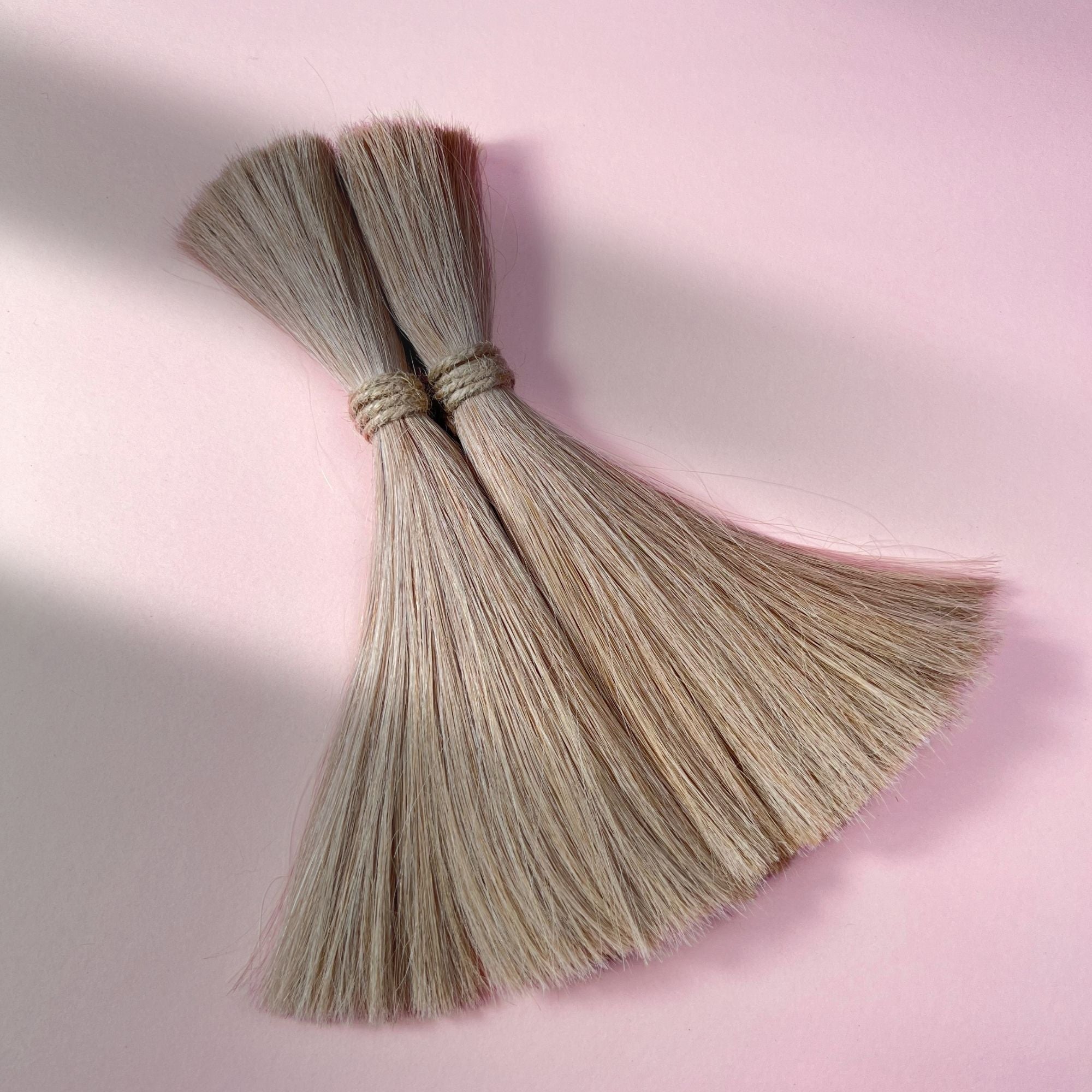 Full view of straight human hair in Golden Blonde.