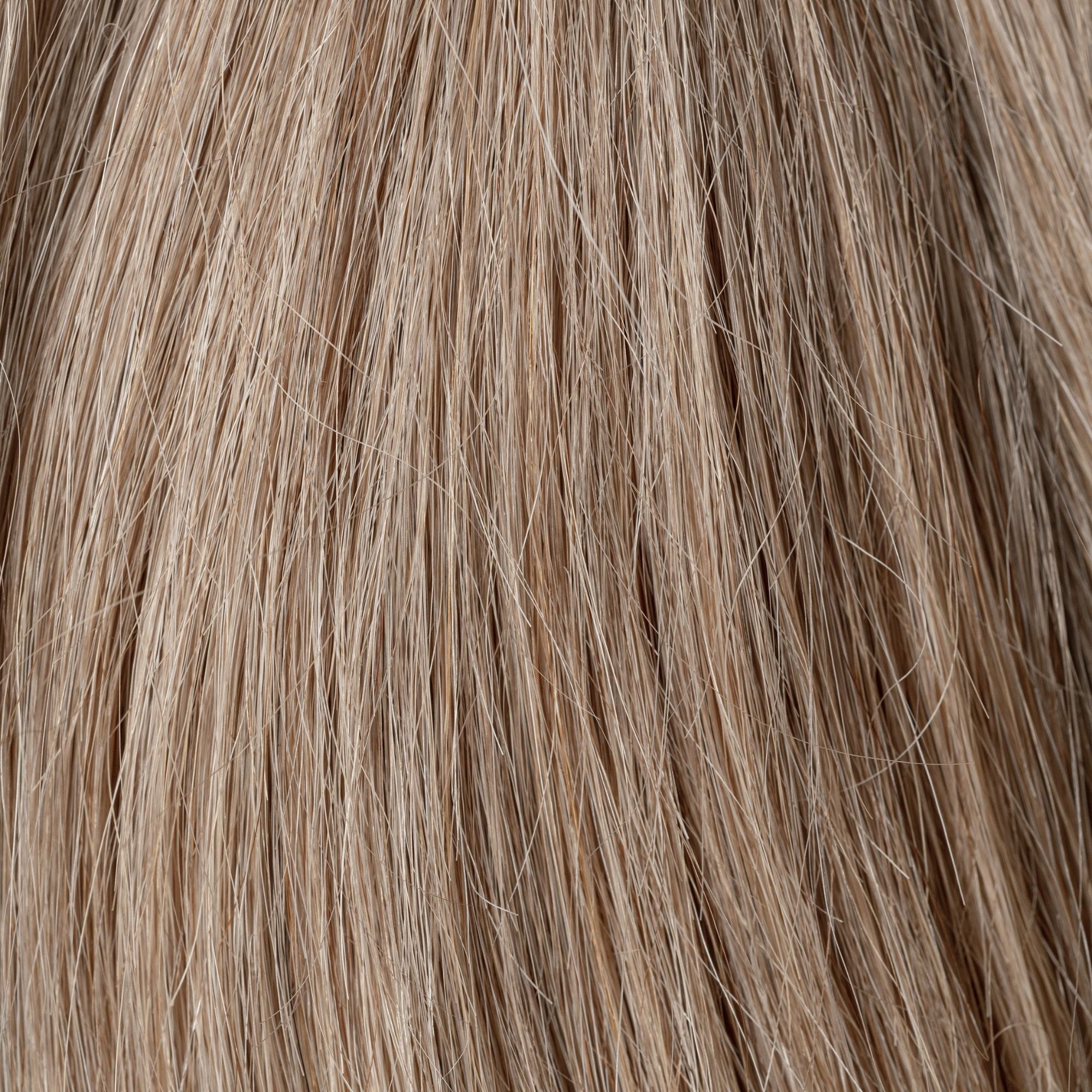 Close-up of Tuscan Sun loose human hair texture for Straight Loc Extensions