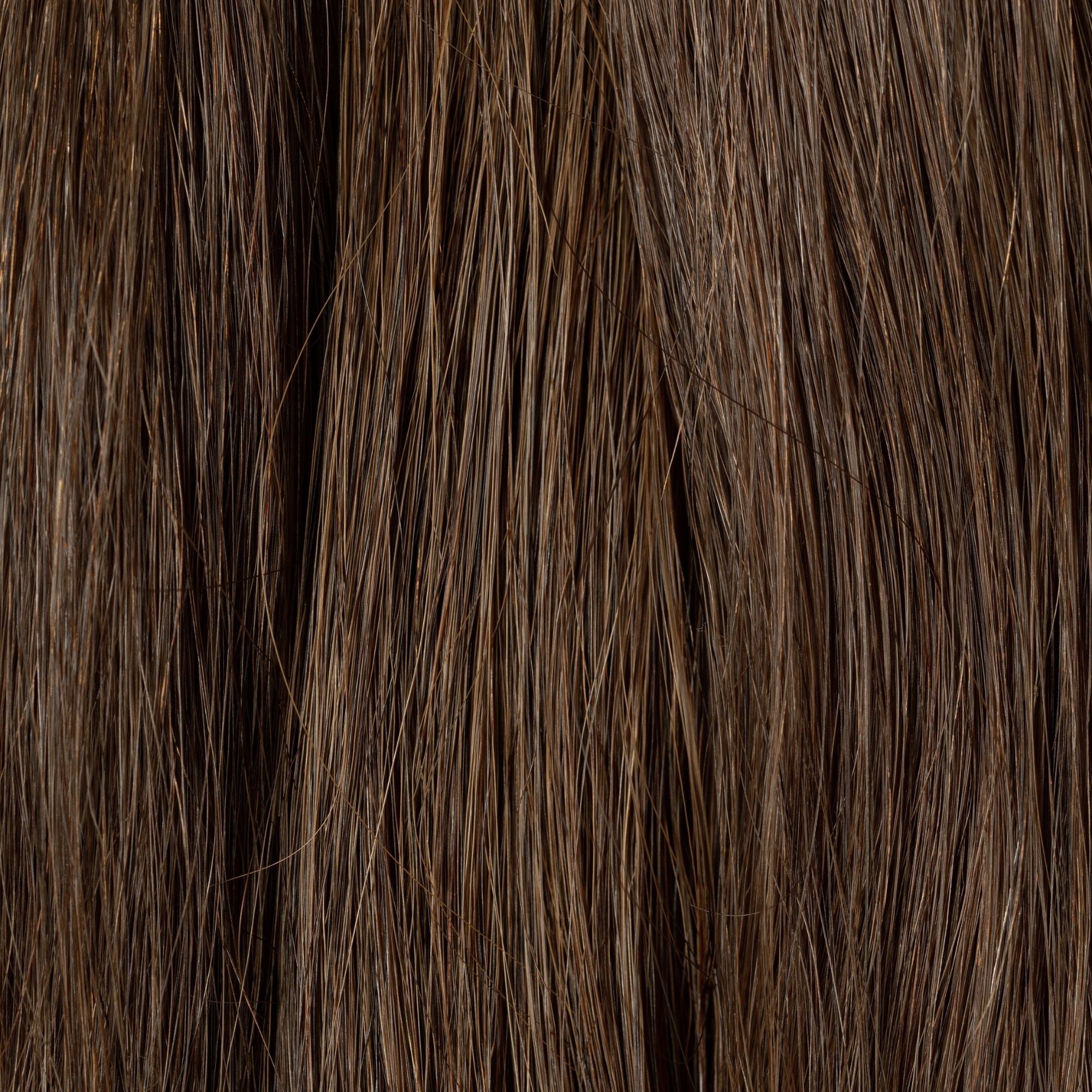 Close-up of Umber loose human hair texture for Straight Loc Extensions