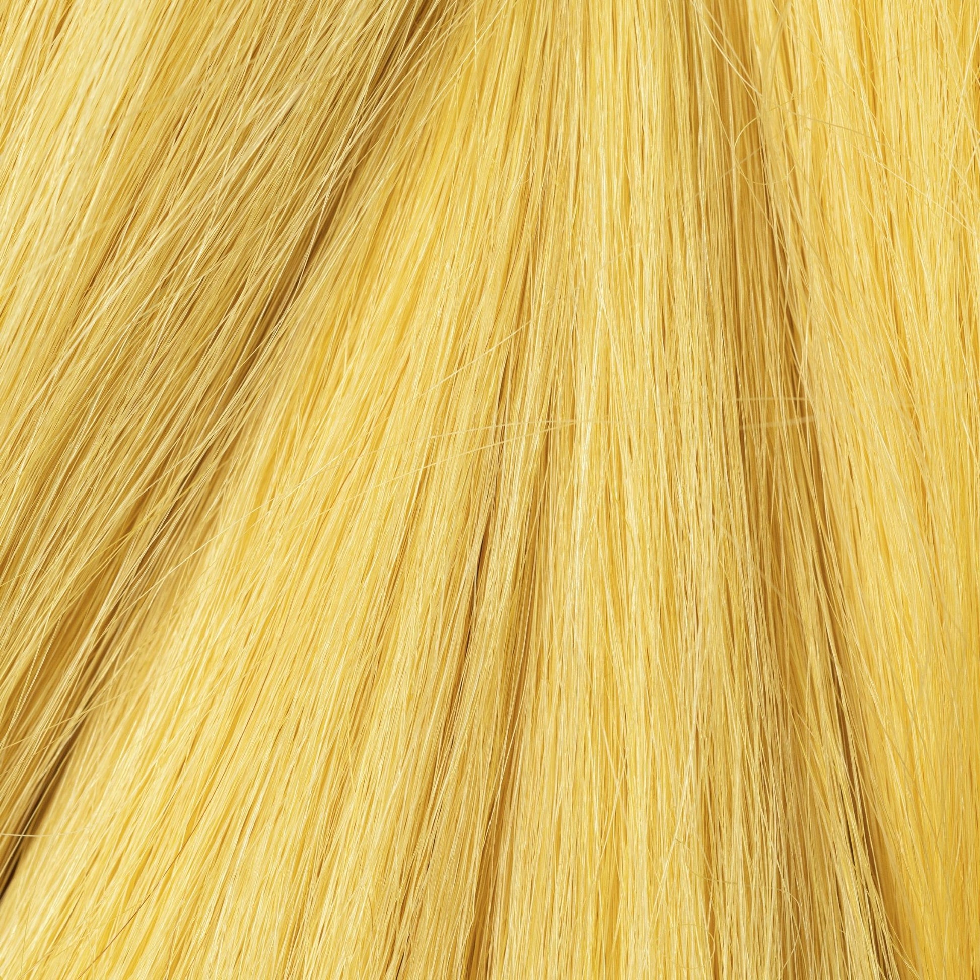 Close-up of Yellow Ochre loose human hair texture for Straight Loc Extensions