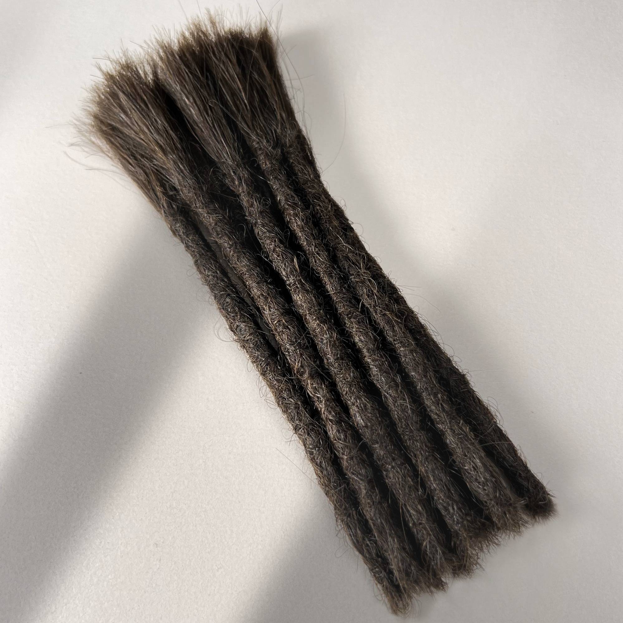 Full view of permanent straight loc extensions with blunt ends in Dark Wenge Brown.