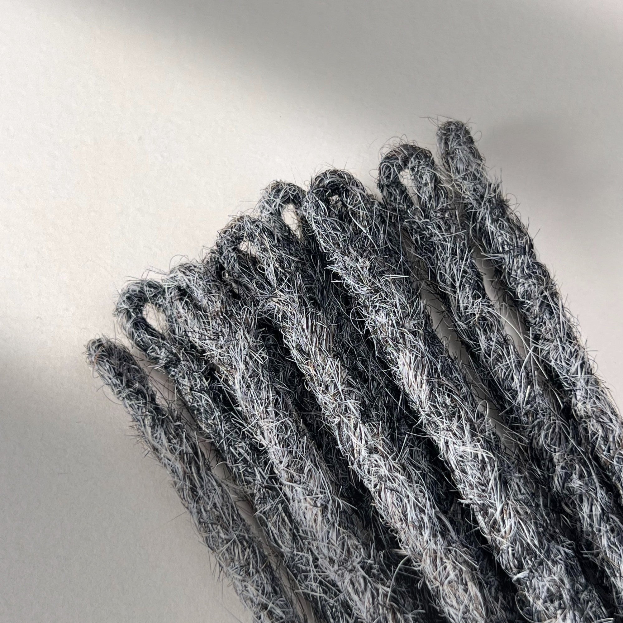 Loop detail of temporary single-ended straight loc extensions in Steel Silver.