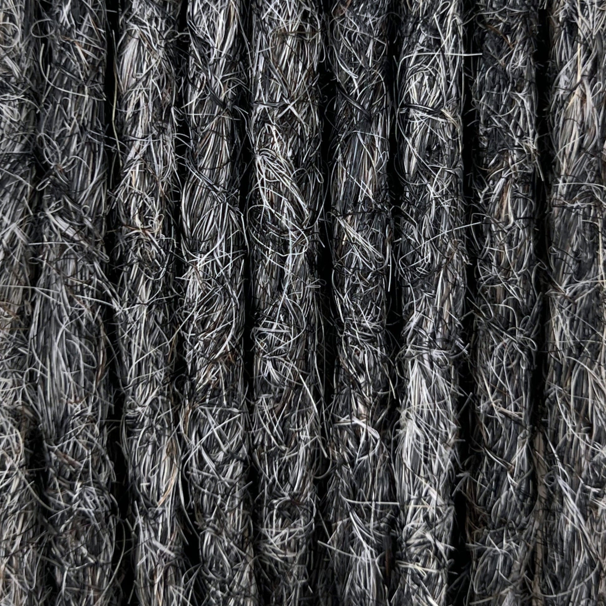 Close-up of straight loc extensions in Steel Silver, showing the texture and color.