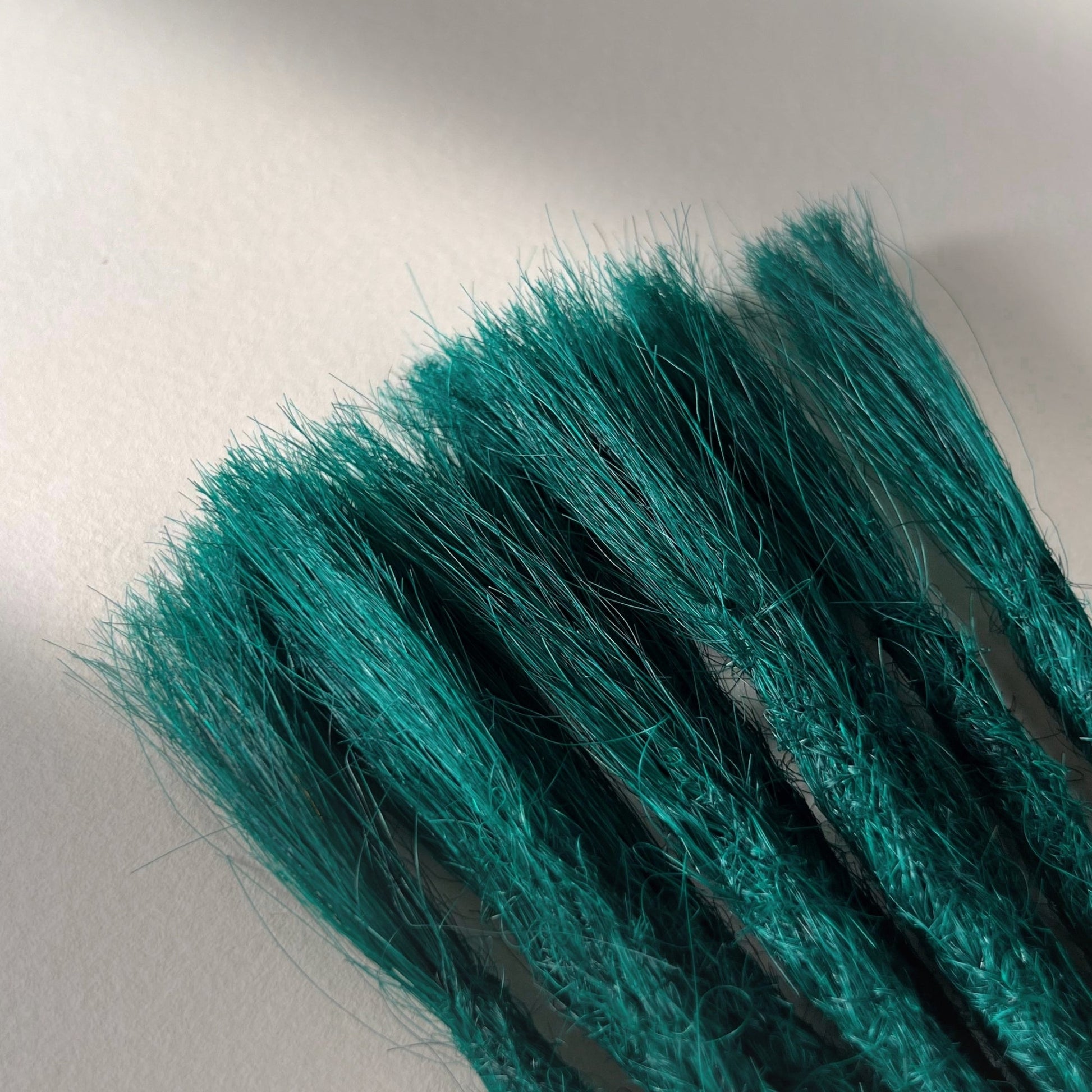 Connection point of permanent straight loc extensions in Forest Green.