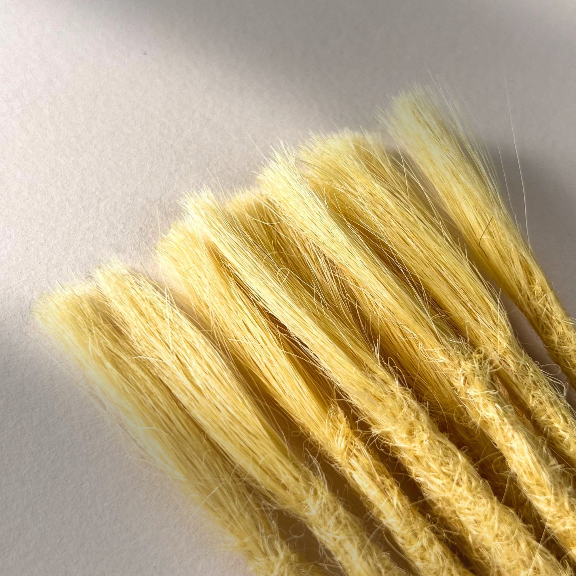 Connection point of permanent straight loc extensions in Soft Ochre.